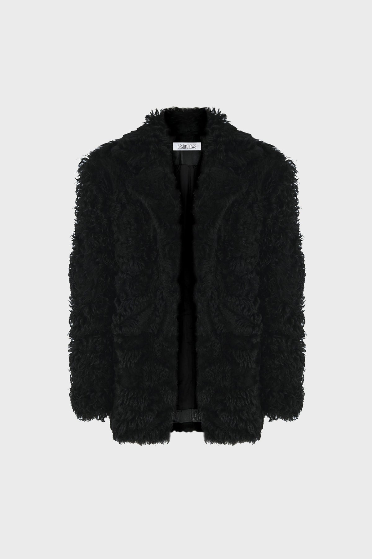 BLACK COAT IN SHEARLING